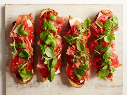 Roasted tomato tartines with prosciutto