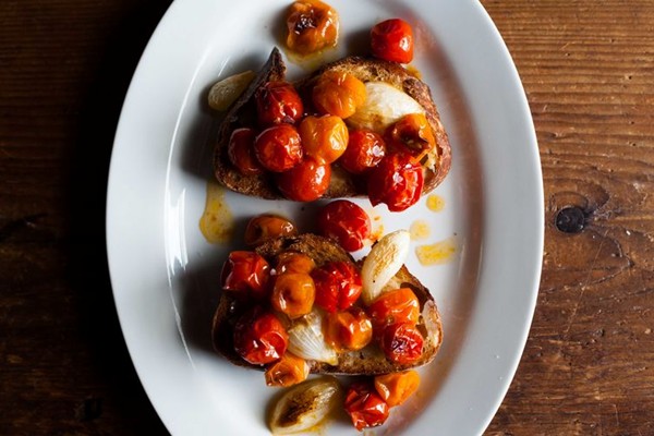 Roasted tomatoes and onions on toast