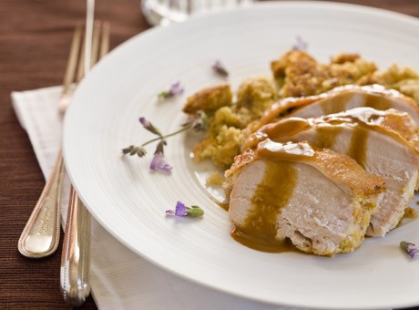 Roasted turkey breast with corn bread-sage stuffing and brandy gravy