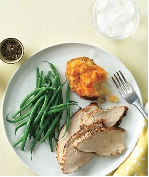 Roasted turkey with cheddar-stuffed potatoes