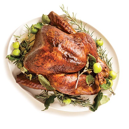 Roasted turkey with rosemary-garlic butter rub and pan gravy