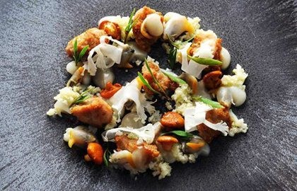 Roasted veal sweetbreads, cockles, cauliflower cous-cous and girolles