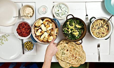 Roasted veg with tahini sauce topped with halloumi