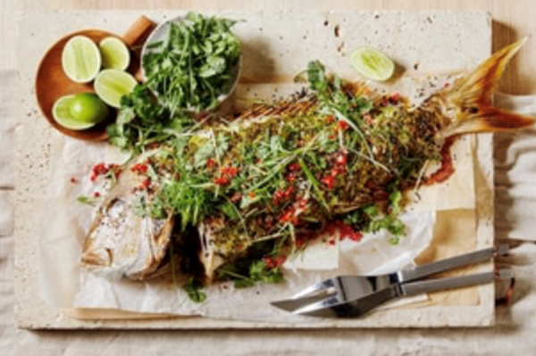 Roasted whole fish with long green shallots and sesame