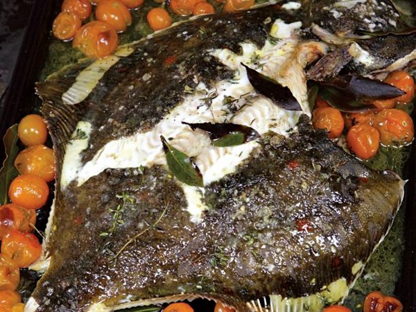Roasted whole plaice with cherry tomatoes