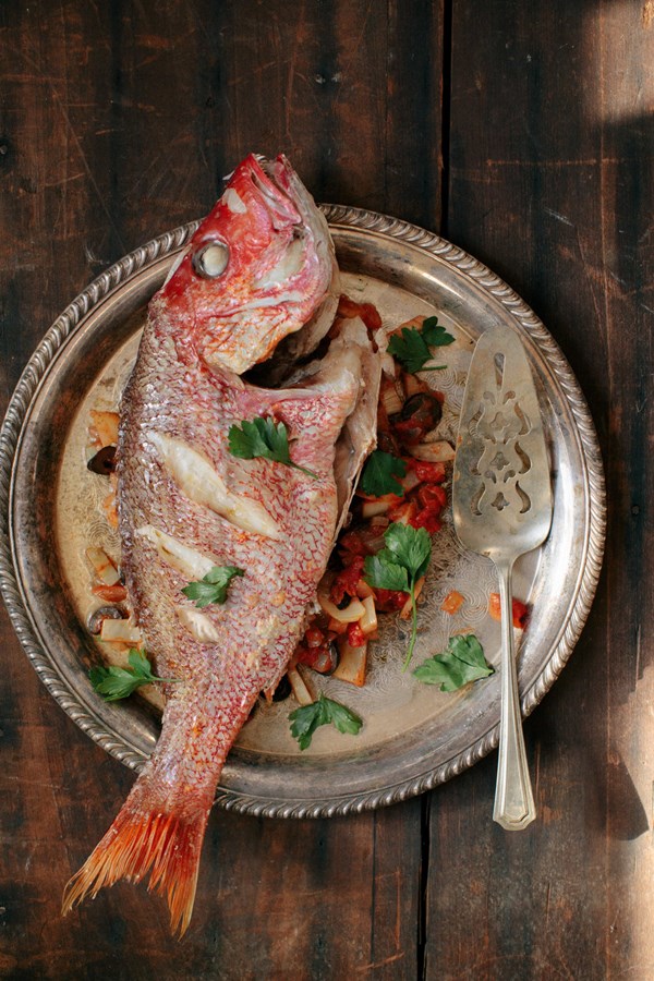 Roasted whole red snapper with tomato, fennel, and olives