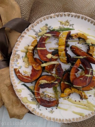 Roasted winter squash with lemon-tahini dressing