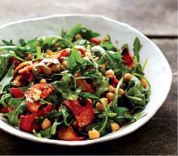 Roasted winter vegetables and arugula salad with mustard dressing
