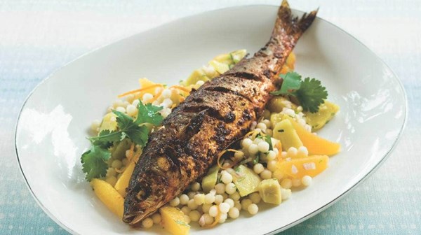 Roasted yellow-eyed mullet with warm kumara, orange and couscous salad