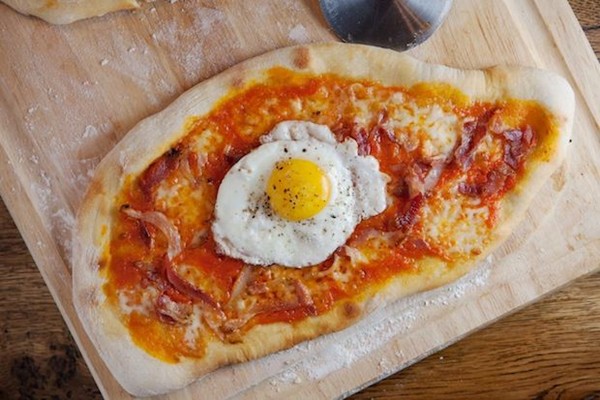 Roberta's pizza with guanciale and egg
