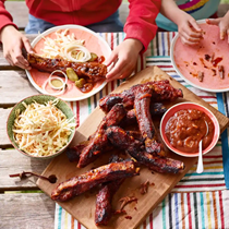 Robin, Sam and Lucy's Texas-style meaty pork ribs with Pappy's barbecue sauce and traditional slaw
