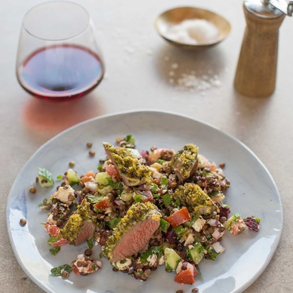 Rocket pesto-crusted lamb with Puy lentil salad