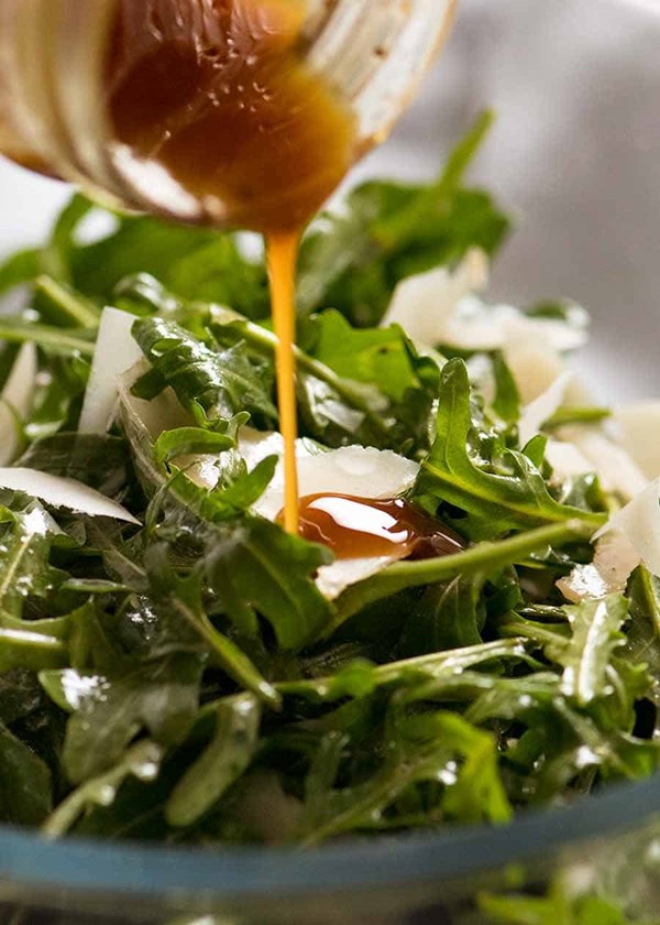 Rocket salad with balsamic dressing and shaved Parmesan