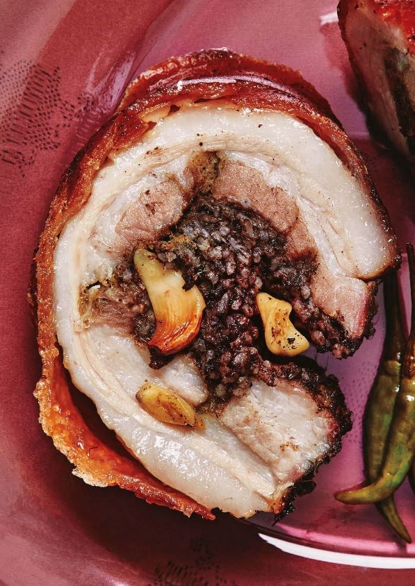 Rolled and stuffed crispy pork belly (Porchetta bellychon)