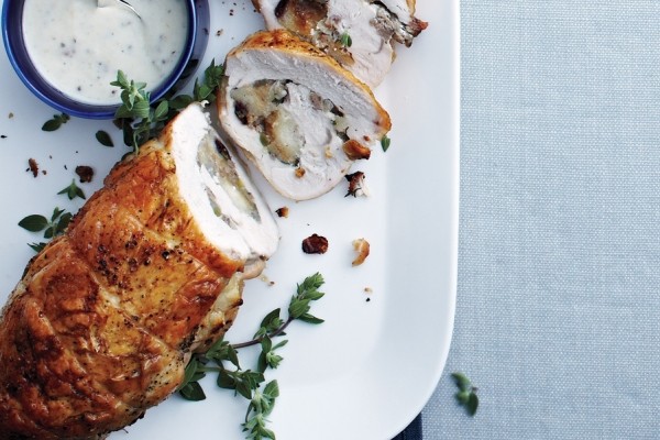 Rolled cranberry turkey breast with creamy gravy