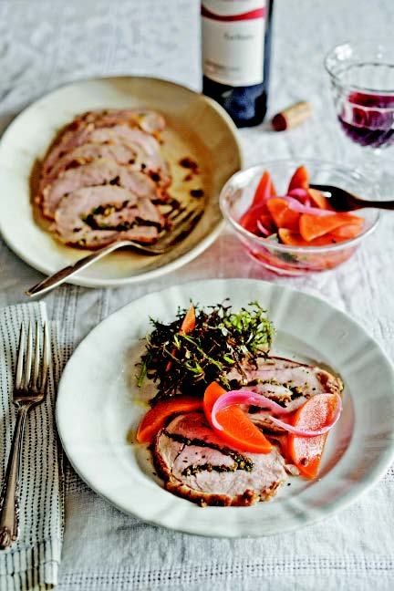 Rolled pork loin roast stuffed with olives and herbs