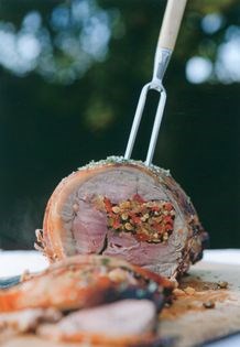 Rolled shoulder of lamb with pepper and pine nut stuffing