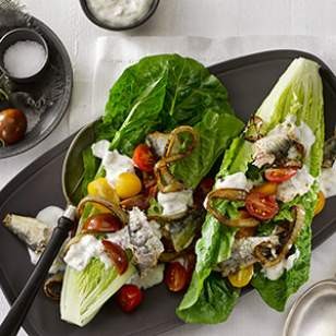 Romaine wedges with sardines & caramelized onions