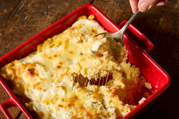 Romanian baked polenta with sour cream and cheese