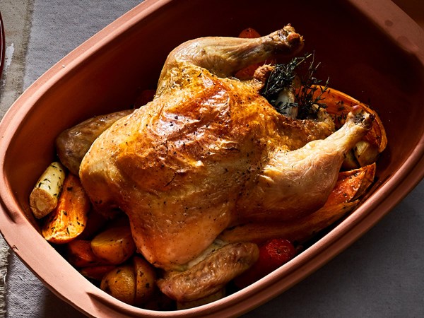 Römertopf-roasted chicken and root vegetables