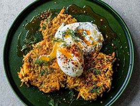 Root veg & lentil fritters with poached eggs, chilli butter and garlic yogurt