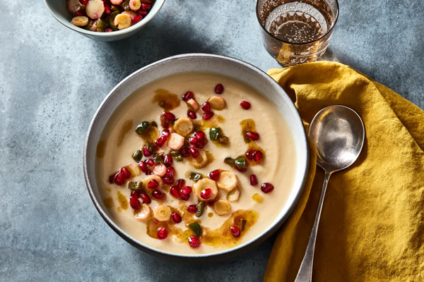 Root vegetable soup with poblano oil & pomegranate seeds