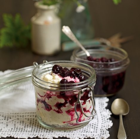 Rose-geranium-stewed blueberries with creamed rice pudding