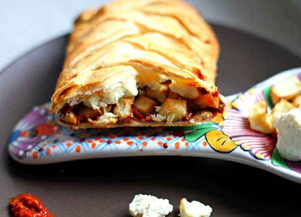 Rose harissa, parsnip and paneer puff pastry plait
