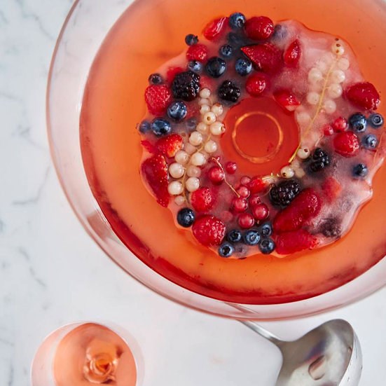Rosé sangria with a mixed-berry ice ring