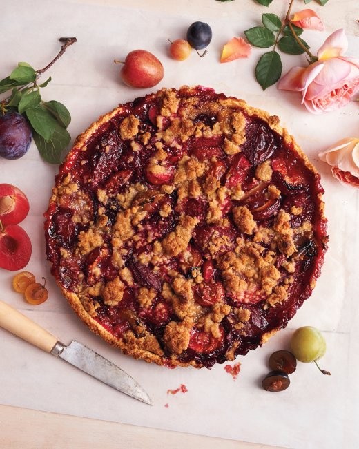 Rose-scented plum crumble tart