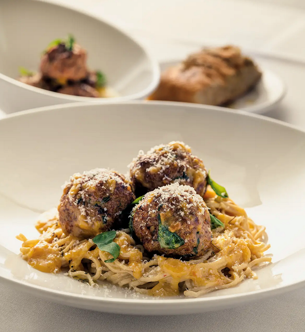Rose veal meatballs with yellow tomato butter