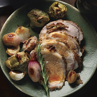 Rosemary and mustard pork loin with baby artichokes, shallots, and vermouth jus