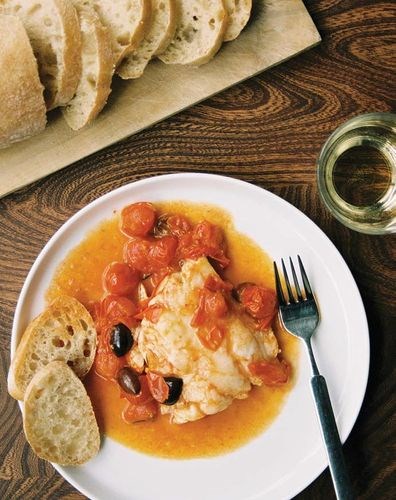 Rosemary and olive hake with cherry tomatoes