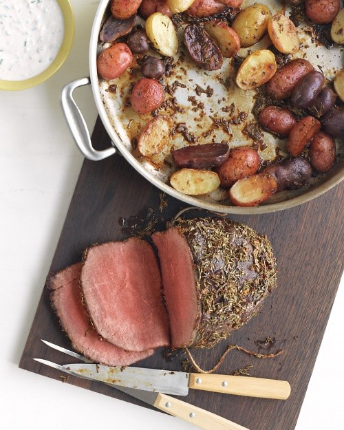 Rosemary-garlic roast beef and potatoes with horseradish sauce