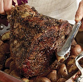 Rosemary-garlic roast leg of lamb with red potatoes