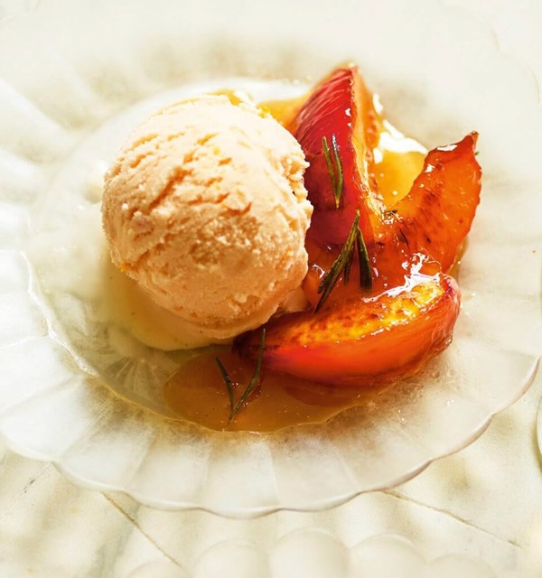 Rosemary peaches with vanilla & orange sherbet