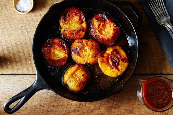 Rosemary-roasted peaches with salted caramel sauce