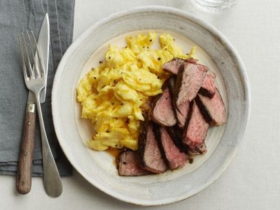 Rosemary steaks with cheesy eggs