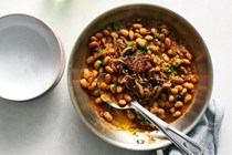 Rosemary white beans with frizzled onions and tomato