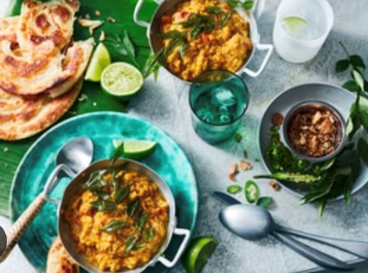Roti canai with yellow lentil curry