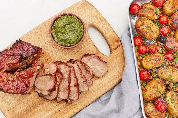  Rotisserie harissa lamb leg with mint and date sauce and roast potato salad