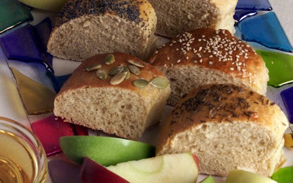 Round challah with seven seeds