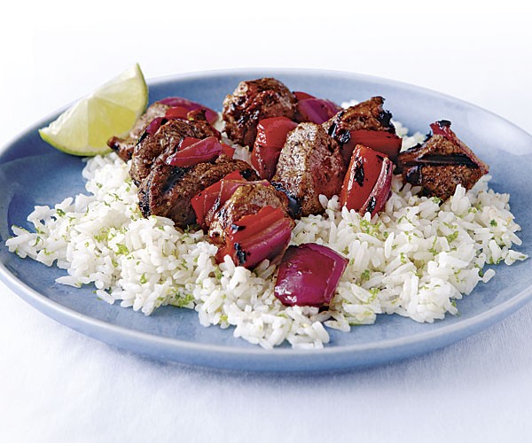 Rum-glazed pork skewers with coconut rice