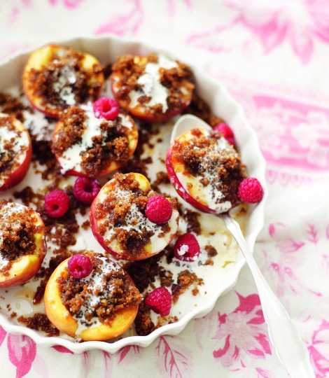 Rum-soaked baked peaches with crumbled Jamaican ginger cake