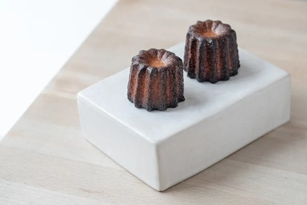 Rum-spiked canelé