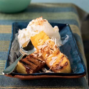 Rum-spiked grilled pineapple with toasted coconut