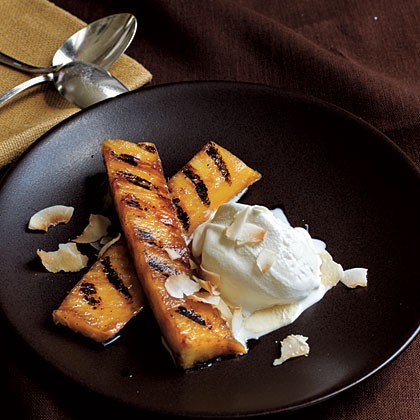 Rum-spiked grilled pineapple with toasted coconut