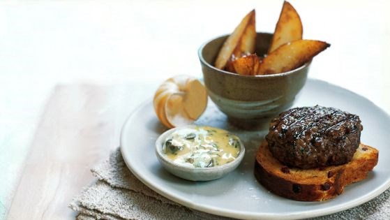 Rumpsteak burger with bacon brioche, and snail and parsley butter sauce
