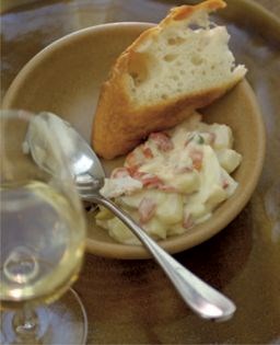 Russian salad of potato, peas, fresh crab, piquillo pepper and mayonnaise (Ensaladilla Rusa con cangrejo)