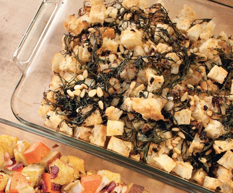 Rustic bread stuffing with red mustard greens, currants, and pine nuts